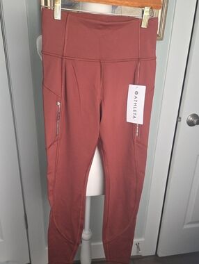 Athleta Rust-Colored High-Waist Performance Leggings with Side Zips